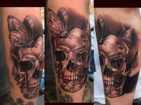 Skull And Butterfky Tattoo On Arm