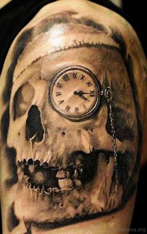 Skull And Clock Tattoo On Left arm 