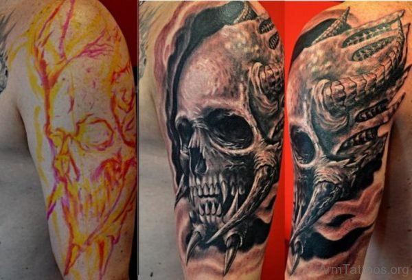 Skull Tattoo On Half Sleeve