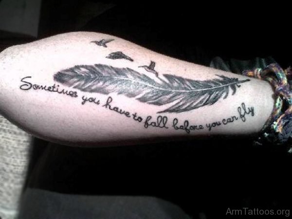 Small Birds Feather And Wording Tattoos On Arm