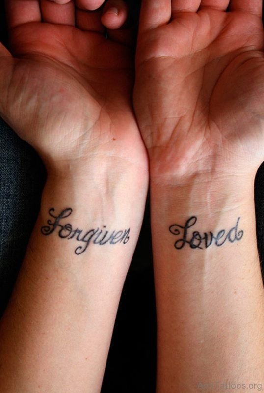 Small Love Ambigram Tattoo On Wrist