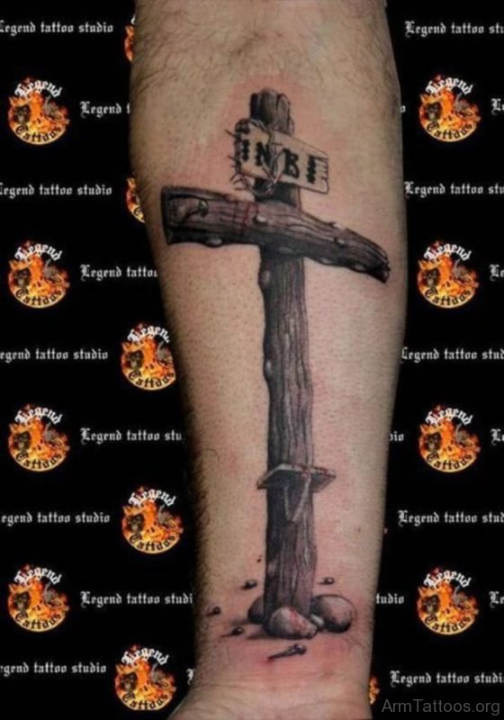 Stunning Cross Tattoo On Arm