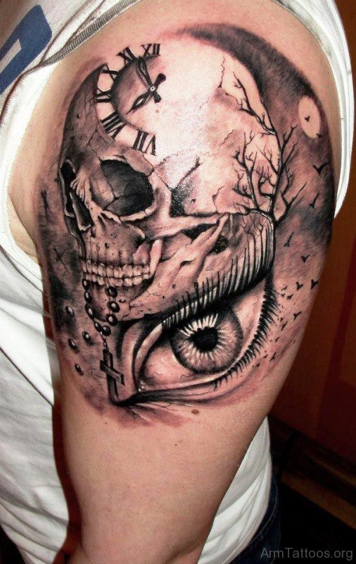 Stylish Skull Clock And Eye Tattoo On Arm 