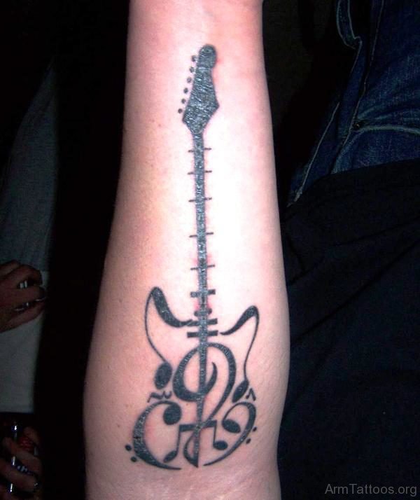 Stylish Tribal Guitar Tattoo 