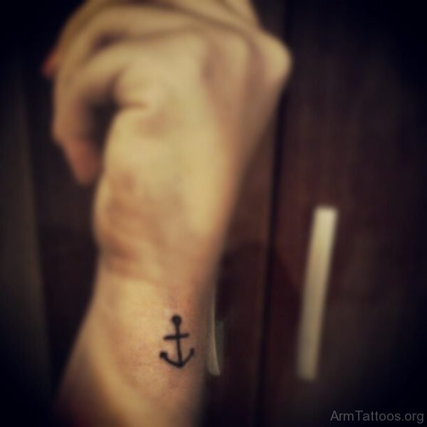 Tiny Anchor Tattoo On Wrist 