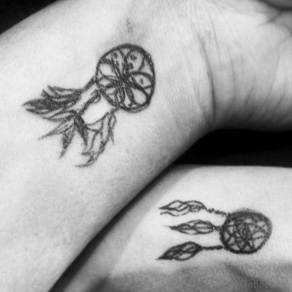 Tiny Dreamcatcher Tattoo On Wrist