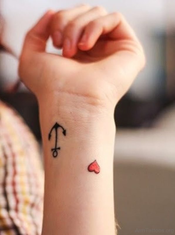 Tiny Heart Arrow Tattoo 