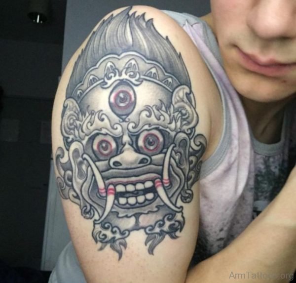 Traditional Barong Mask Tattoo On Arm 