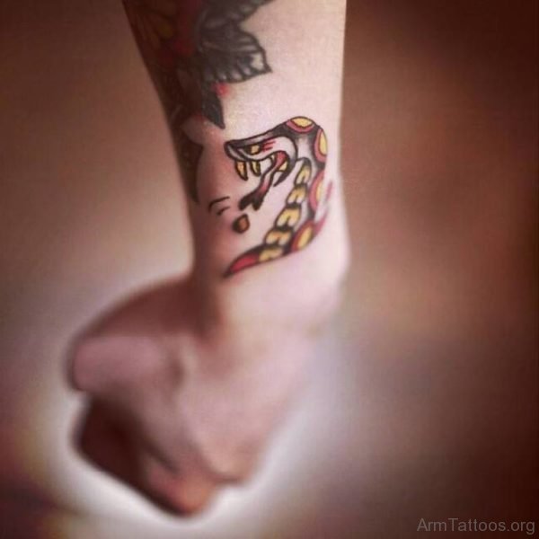 Traditional Snake Tattoo On Wrist 