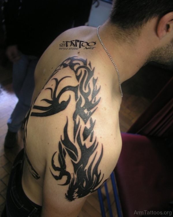 Tribal Dragon Tattoo On Shoulder For Guys