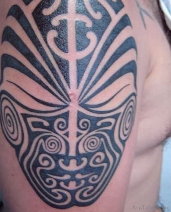 Tribal Mask Tattoo On Arm 