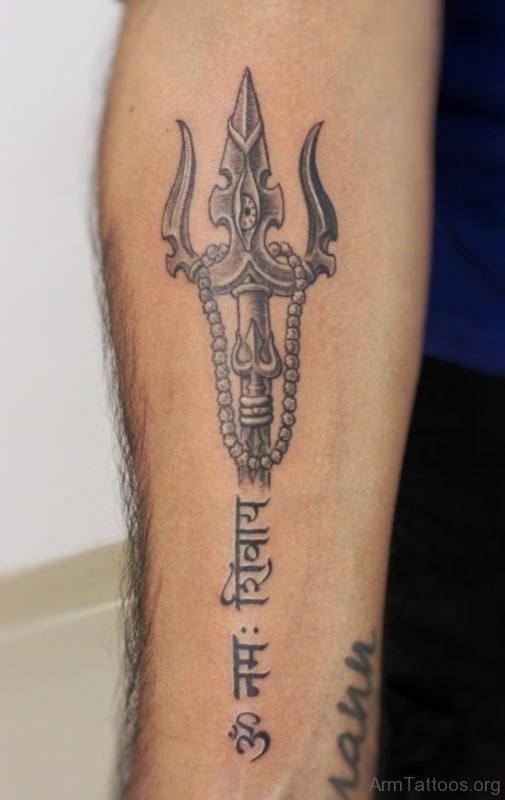 Tribal Om Tattoo On Arm