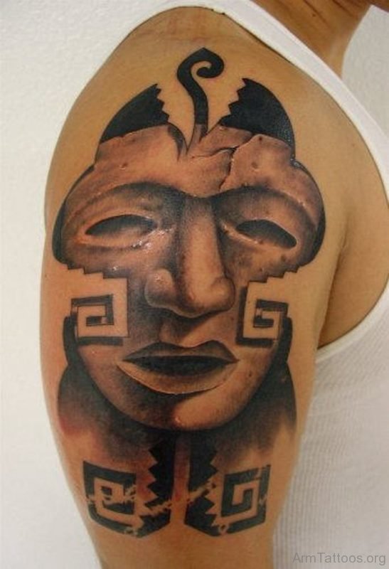 Unique Mask Tattoo On Arm 