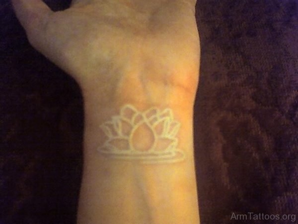 White Ink Lotus Tattoo On Arm