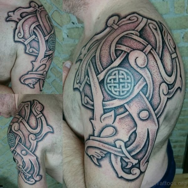 Wonderful Celtic Armour Tattoo On Arm 
