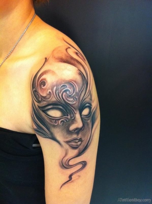 Wonderful Mask Tattoo On Arm 