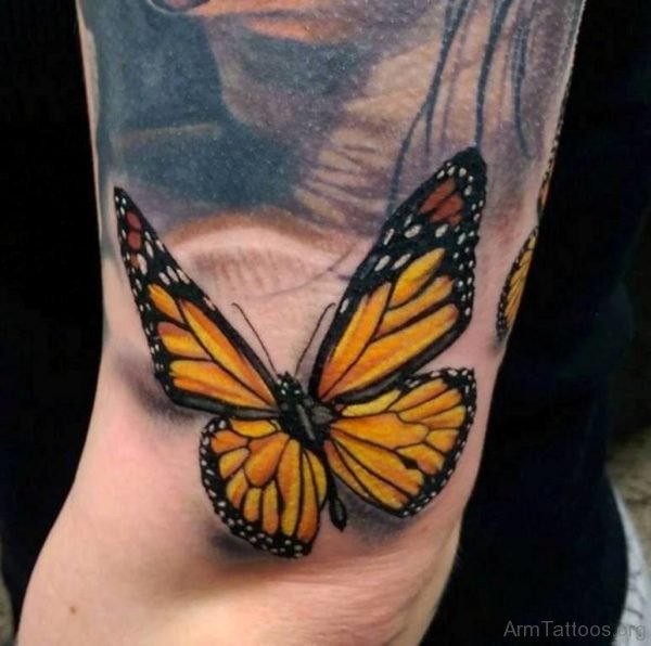 Yellow Butterfly Tattoo On Arm