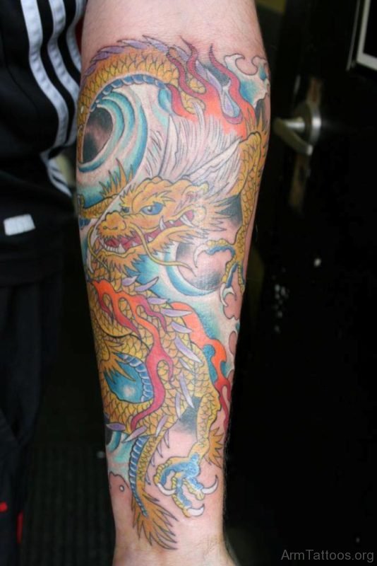 Yellow Dragon Tattoo On Arm