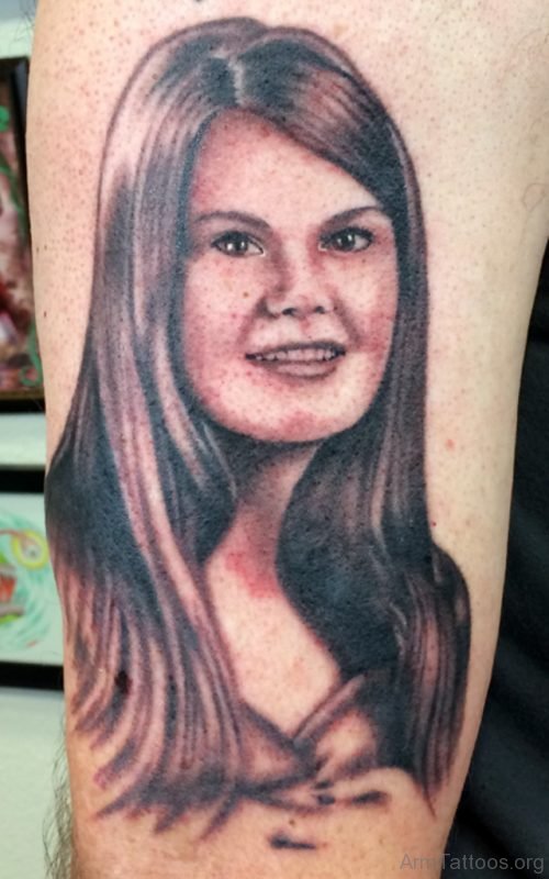 Young Girl Portrait Tattoo On Arm 