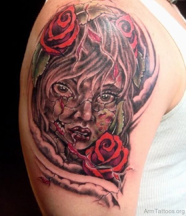 Zombie Girl Head With Red Roses Tattoo On Arm 