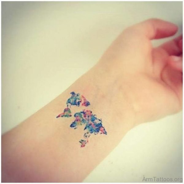 Wrist colorful map tattoo