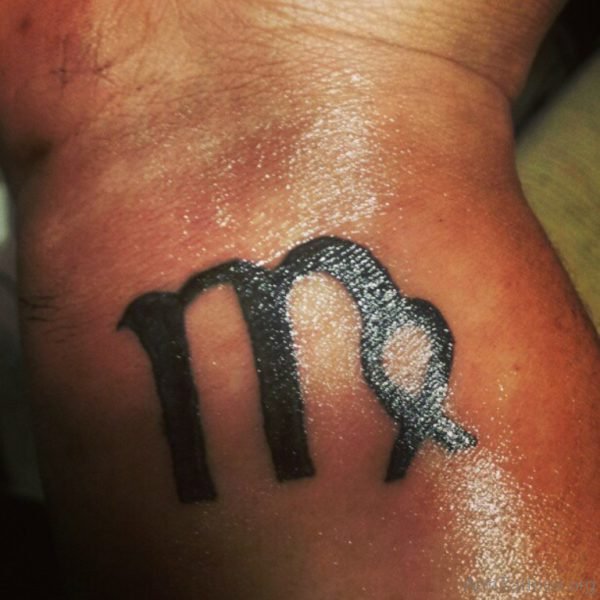 Black Ink Wrist Virgo Zodiac Tattoo